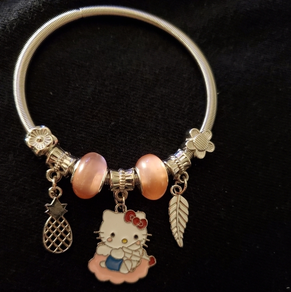 Aw so adorable Hello Kitty with Cupids Bow And Arrow.